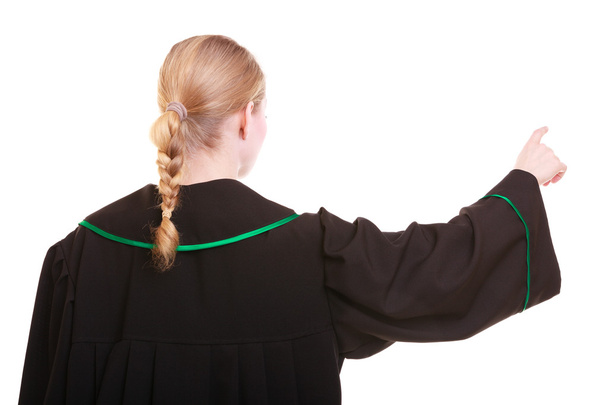 vrouw polish advocaat achteraanzicht wijzend richting met vinger - Foto, afbeelding