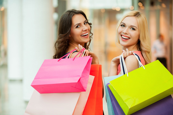 Happy friends shopping. - Фото, изображение