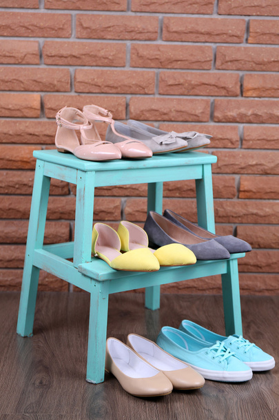 Shoe shelf with women shoes - Фото, зображення