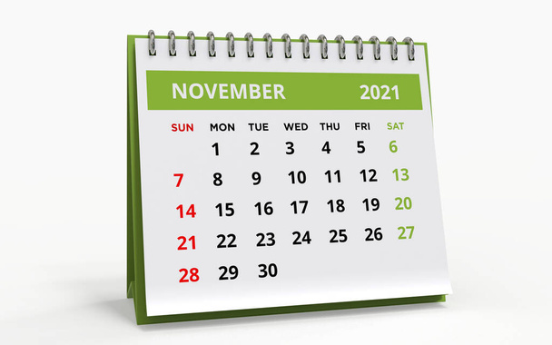 スタンドデスクカレンダー2021年11月金属スパイラルバインド付きのビジネス毎月のカレンダーは、 1週間は日曜日に始まります。白色のベースと緑色のタイトルの月次ページは、白い背景に隔離され、 3Dレンダリングされます。. - 写真・画像