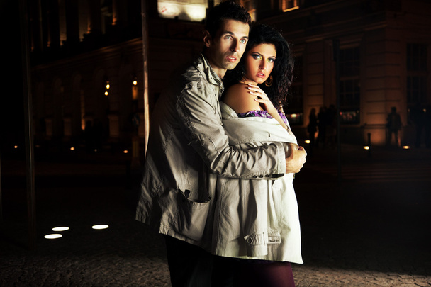 Attractive young couple at night - Foto, Imagen