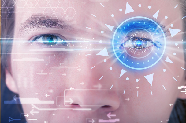 Киберчеловек с технологическим глазом, изучающий голубую радужную оболочку
 - Фото, изображение