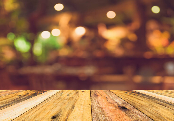 image of wood table and blurred bokeh background. - Photo, Image