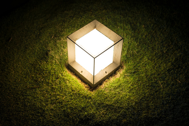 Lighting cube lantern on grass - Photo, Image