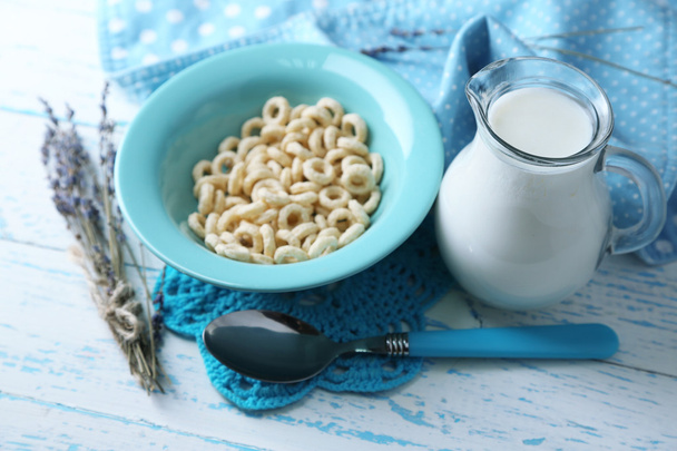 Homemade yogurt and delicious  cereals in bowl on wooden table background - 写真・画像