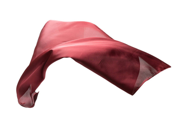 Ροή κόκκινο μεταξωτό μαντήλι απομονωμένο σε λευκό φόντο.  - Φωτογραφία, εικόνα