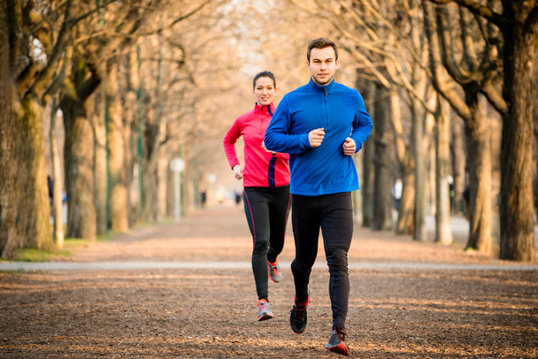 Couple jogging together - Fotoğraf, Görsel