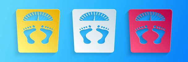 Paper cut Bathroom scales with footprints icon isolated on blue background. Weight measure Equipment. Weight Scale fitness sport concept. Paper art style. Vector. - Vector, Image