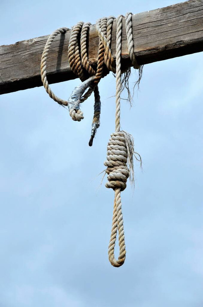 Old western gallows with hang noose and wooden coffin.  - Photo, Image
