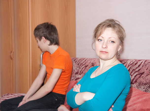 Mother and teen  son having quarrel at home - Photo, Image