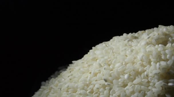 Berg van rauwe rijst draaien - Video