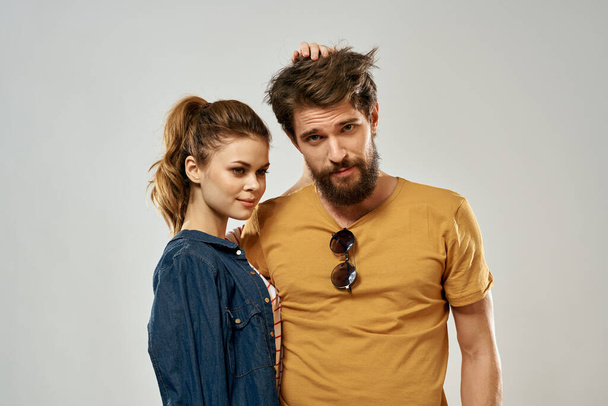 Young couple lifestyle emotions communication fashion light background - Photo, Image