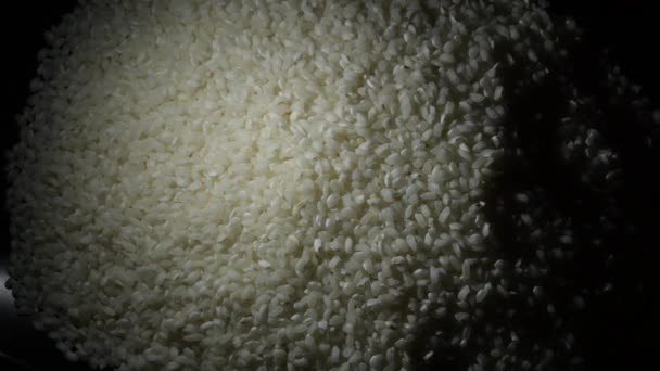 Колебание сырого риса с интимным освещением - Кадры, видео
