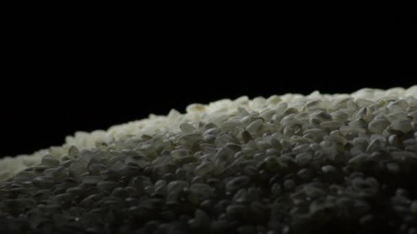 montanha de arroz transformando com fundo preto - Filmagem, Vídeo