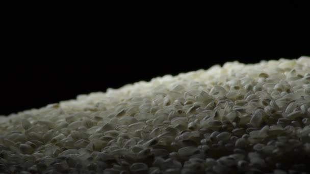 Montaña de arroz crudo girando - Metraje, vídeo