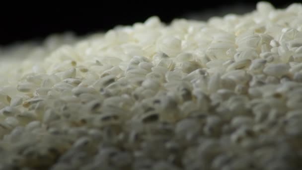 Granos de arroz crudo girograma de montaña - Imágenes, Vídeo