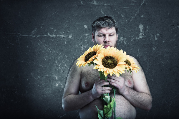 Studio ampua miehen kukkakimppu auringonkukat
 - Valokuva, kuva