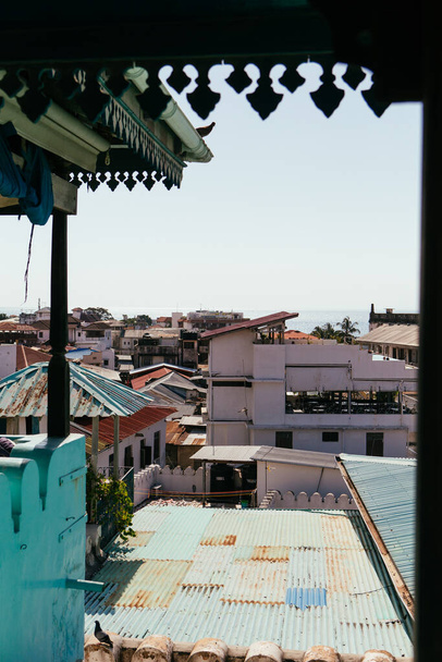 Beautiful view at roofs of Old Town during sunny day, Stone town, Zanzibar - Photo, Image