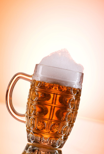 Beer glasses against the colorful gradient background - Photo, Image