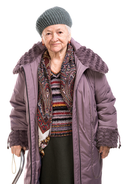 stará žena s holí v vynosit - Fotografie, Obrázek