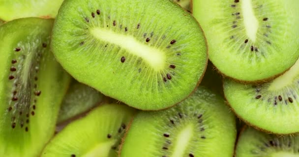 rotující plátky zelené syrové kiwi - Záběry, video
