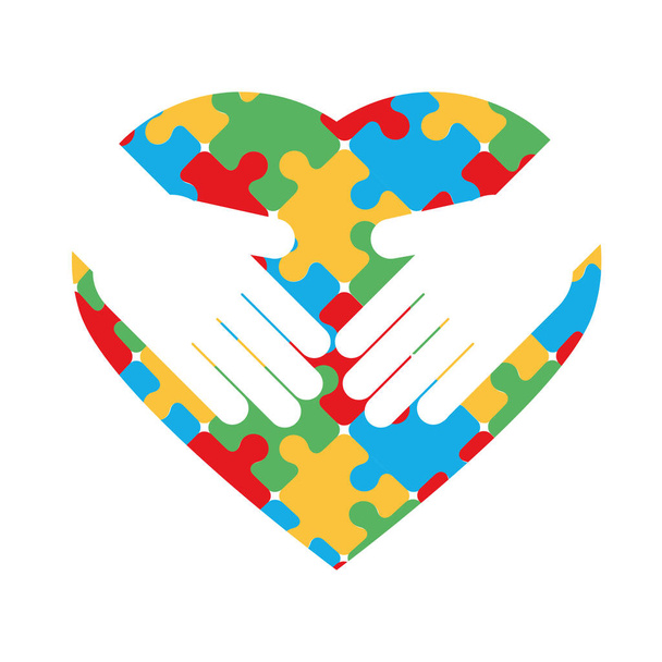 maailman autismi päivä kädet palapelit muotoinen sydän valkoinen tausta - Vektori, kuva