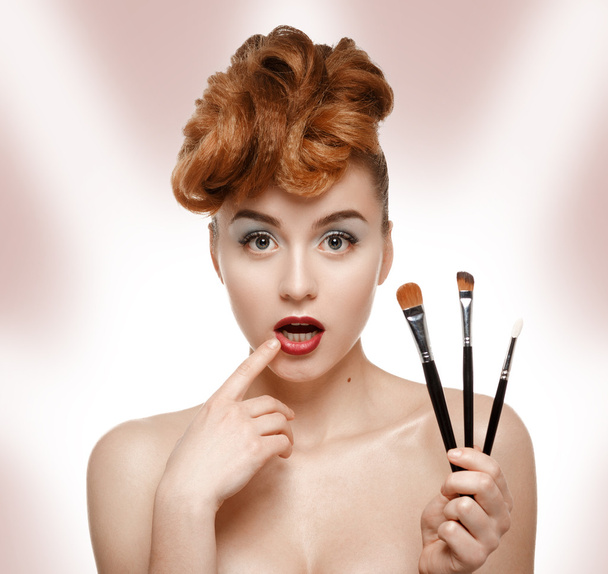 Girl can not choose a brush for makeup - Photo, Image