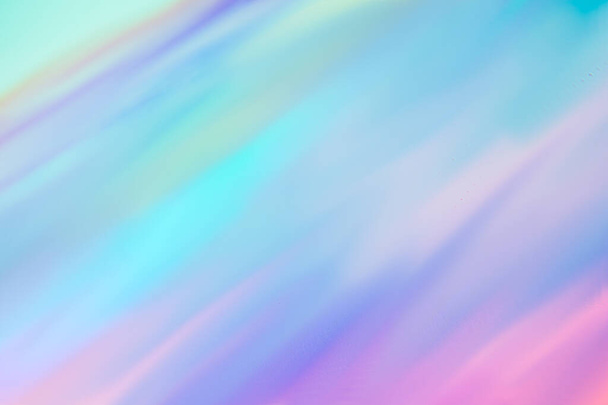 Holographic foil blurred abstract background for trendy design. Fantasy colorful card. Holographic sparkly cover with soft pastel colors - Photo, Image