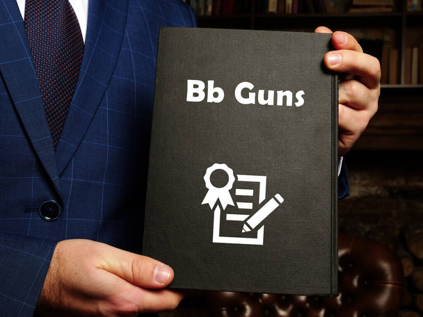  Concept juridique sur les pistolets Bb avec inscription sur le morceau de papier - Photo, image