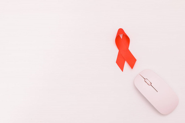 Red ribbon symbolizes world health day - Foto, Imagem