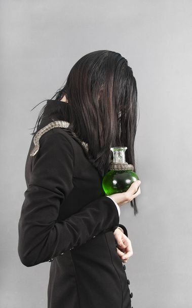 The sad person with snake hold poison - Photo, Image