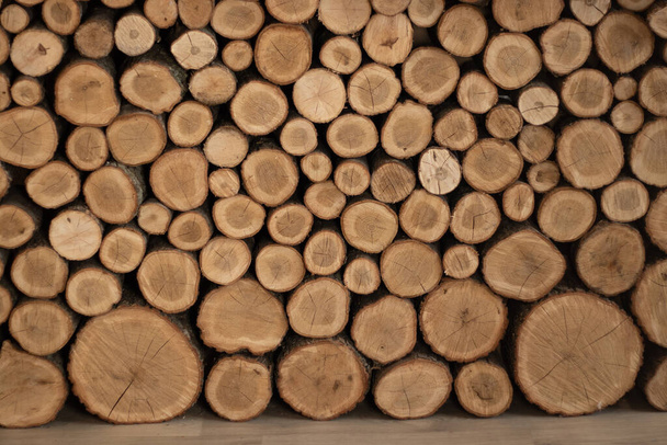 background from sawn wooden logs for decor, wooden background - Photo, Image