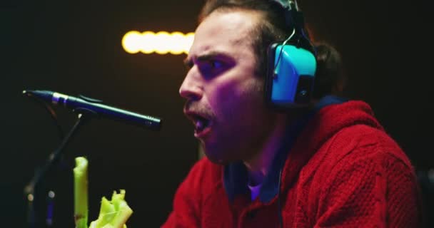 Sound designer imitating eating and laugh noises - Footage, Video