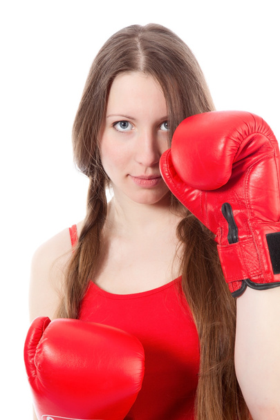 Woman wearing boxing gloves - Foto, afbeelding
