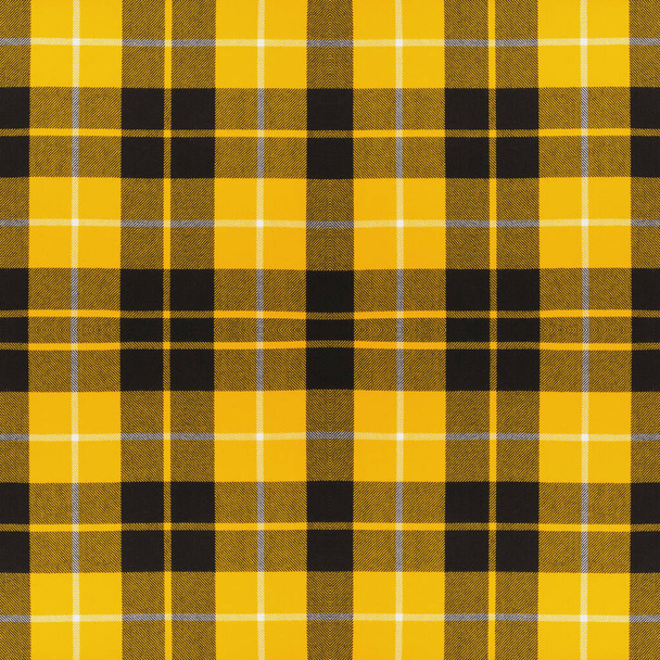 Beautiful seamless noble tartan yellow, black and white colors.  Abstract classic colors checkered plaid squares pattern. Simple geometric tartan pattern of lines and squares of different colors. Vintage beauty of checkered design. - Photo, Image
