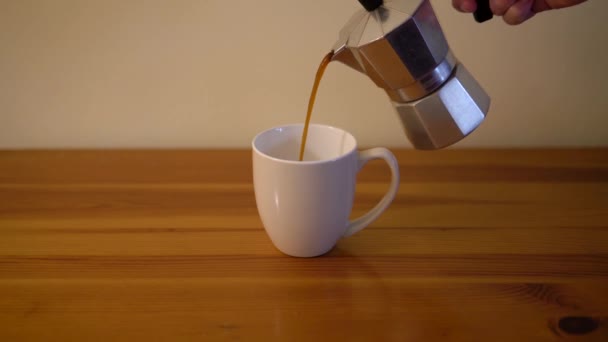 serving coffee latte in white cup on wooden table - Footage, Video