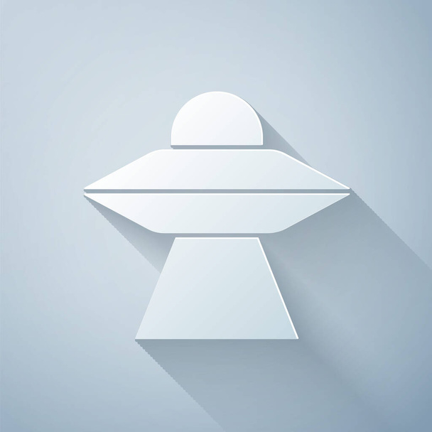 Icona dell'astronave volante UFO tagliata su sfondo grigio. Piattino volante. Nave spaziale aliena. Futuristico oggetto volante sconosciuto. Stile cartaceo. Vettore. - Vettoriali, immagini