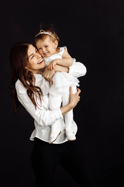 happy young beautiful mother with little cute girl  - Zdjęcie, obraz