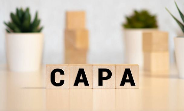CAPA palabra hecha con bloques de construcción, concepto de negocio - Foto, imagen
