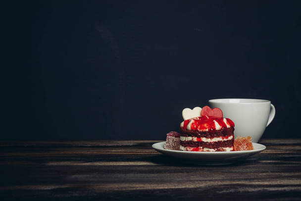 red round cake sweets meal dessert with tea wooden background - 写真・画像