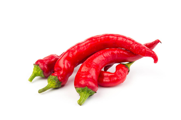 Hot red chili or chilli pepper isolated on white background. - Photo, Image