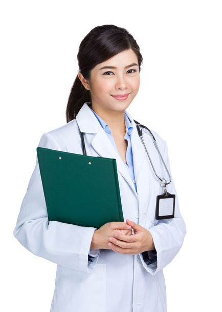 Mujer sonriente médico sujetando el portapapeles
  - Foto, Imagen