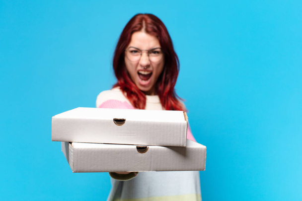 Pretty woman with take away pizza boxes - Photo, Image