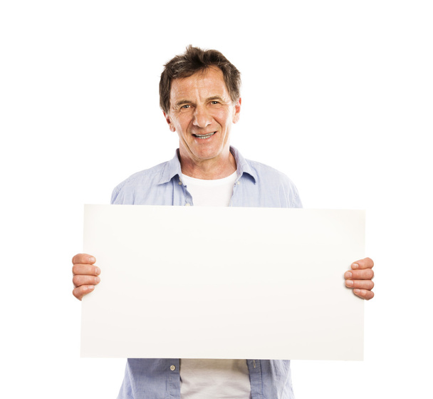 Senior man with advertising board - Photo, image