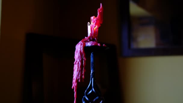 Close up of a lit candle with wax dripping and consuming - Footage, Video