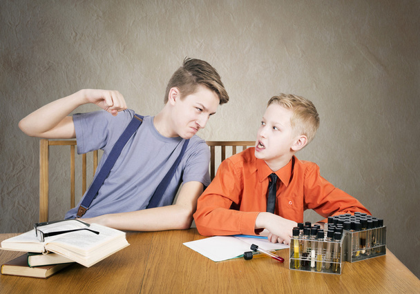 Boys conflict . Experiences with test tubes - Photo, Image