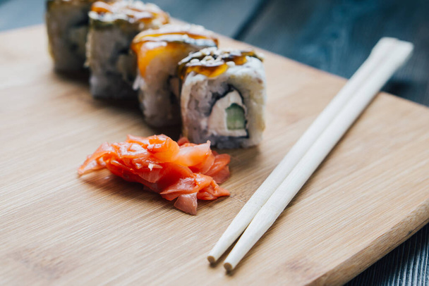 ginger sushi chopsticks wood board sauce menu restaurant - Photo, Image