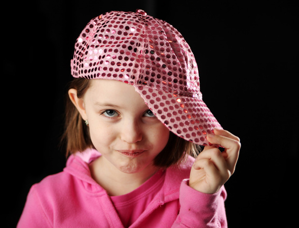 Female child wearing sparkly pink baseball cap - Photo, Image