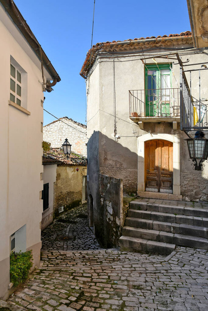 An alley between the old stone houses of Sassinoro, a medieval village in the province of Benevento. - Photo, Image