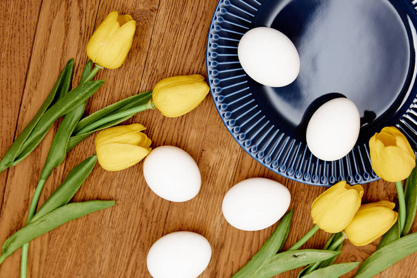 blue plate easter eggs tulips holiday tradition - Photo, Image